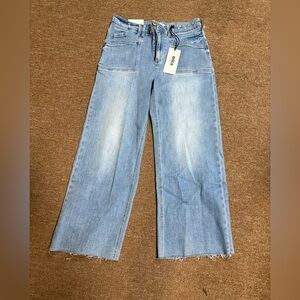 Light Blue Flare Jeans with Frayed Hem